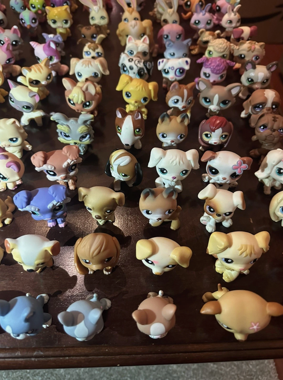 Vintage Littlest Pet Shop figures laid out for generation identification